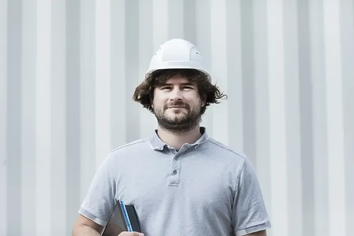 Framed Print : Technician with beard middle aged and working outside with polo shirt and helmet