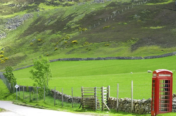 Framed Print : Telephone box in lonely green landscape