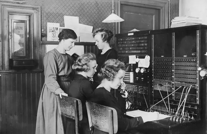 Framed Print : Telephone operators, women working in a switchboard