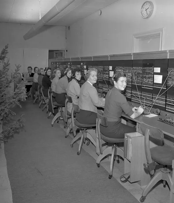 Framed Print : Telephony in the 1950s. Women working at a telephone switchboard as it's operators