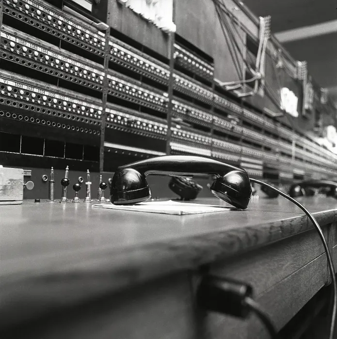 Framed Print : Telephony in the 1970s. Interior from an empty room with a large switchboard visible
