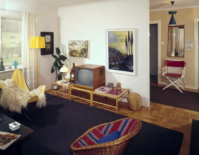 Framed Print : Television in the 1950s. Interior from a room with a typical 50s television set on a tv bench. On the left the Butterfly chair, also known as a BKF chair or Hardoy chair. ref CV7-5 Sweden 1958