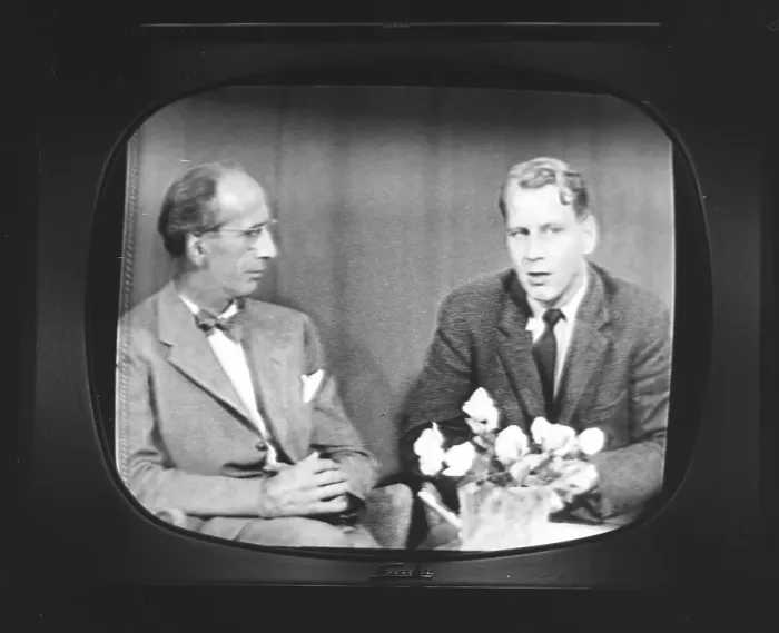 Framed Print : Television in the 1950s. A typical black and white tv screen photographed when a broadcast is