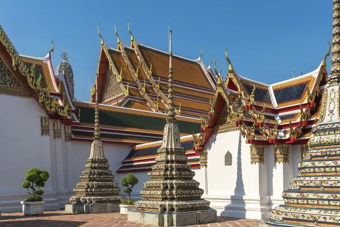 Framed Print : The temple complex Wat Pho with the main building called Prah Ubosot and the small Chedis Framed Print : The temple complex Wat Pho with the main building called Prah Ubosot and the small Chedis