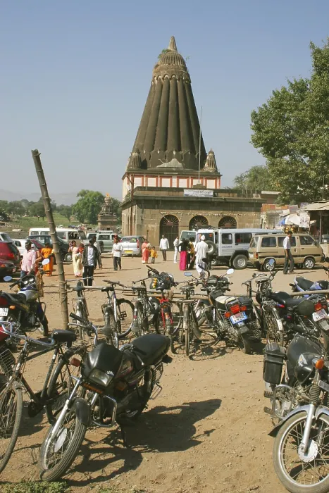 Framed Print : Temple dedicated to lord ganesh named dholu ganpati with bicycles motorcycles and cars in parking lot Framed Print : Temple dedicated to lord ganesh named dholu ganpati with bicycles motorcycles and cars in parking lot