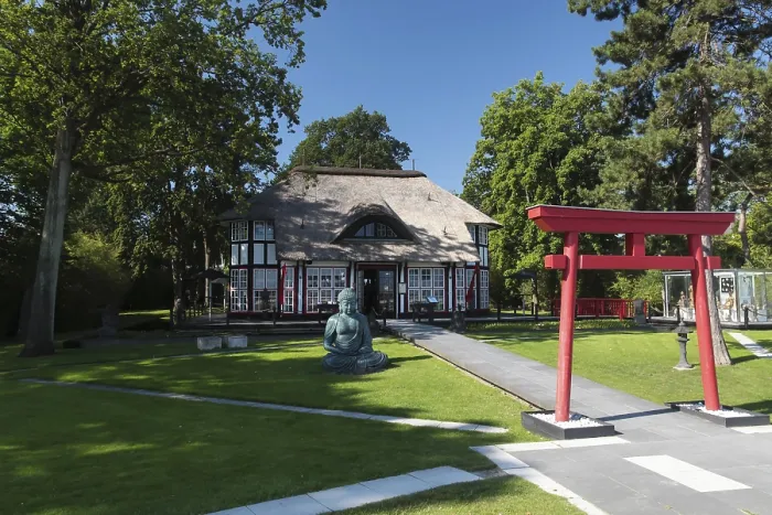 Framed Print : Thatched roof house Mikado Garden with Buddha rope Framed Print : Thatched roof house Mikado Garden with Buddha rope