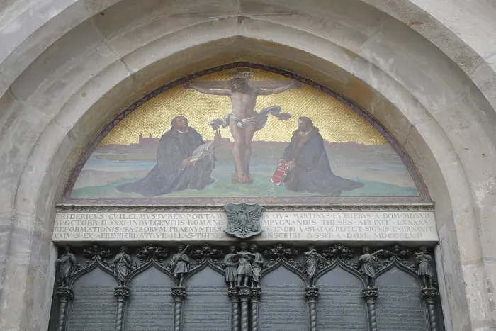 Framed Print : Thesis door with tympanum and crucifix with Philipp Melanchthon and Martin Luther