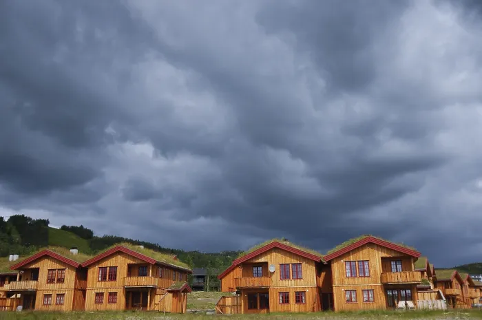 Framed Print : Thunderclouds over a holiday-home area Framed Print : Thunderclouds over a holiday-home area