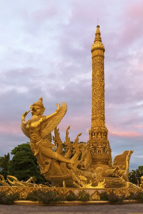 Framed Print : Thung Si Muang Park, Mueang, Garuda figure in front of the Golden Giant Candle