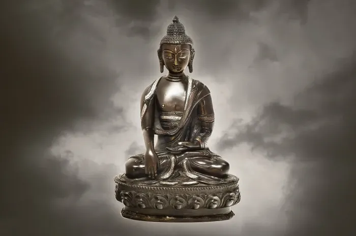 Framed Print : Tibetan Buddha statue made of bronze, with clouds Framed Print : Tibetan Buddha statue made of bronze, with clouds