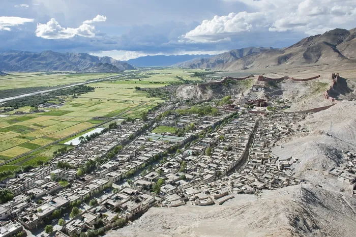Framed Print : Tibetan Buddhism, aerial view, Palcho Monastery with the Kumbum Stupa behind the historic district