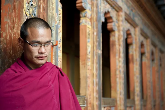 Framed Print : Tibetan Buddhism, monk in a red robe