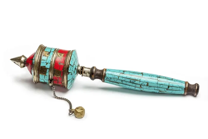 Framed Print : Tibetan buddhist Mani wheel or hand prayer wheel isolated on white Framed Print : Tibetan buddhist Mani wheel or hand prayer wheel isolated on white