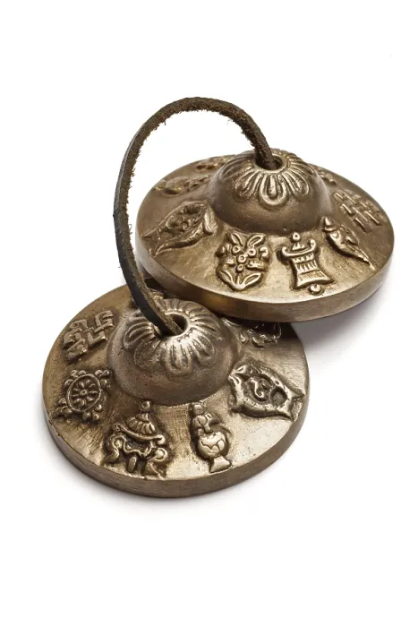 Framed Print : Tibetan Buddhist tingsha cymbals isolated on white