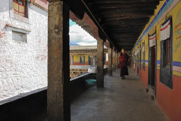 Framed Print : A Tibetan monk in the central temple