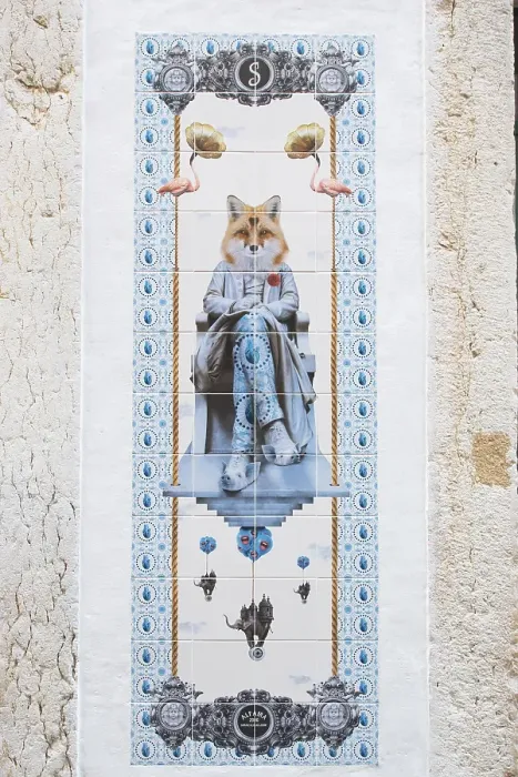 Framed Print : Tile image on a wall, fox sitting on a chair