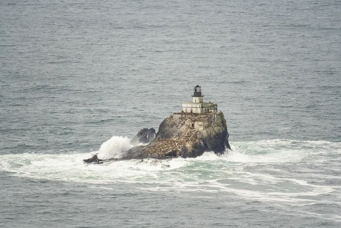 Framed Print : Tillamook Rock Light Lighthouse in strong surf