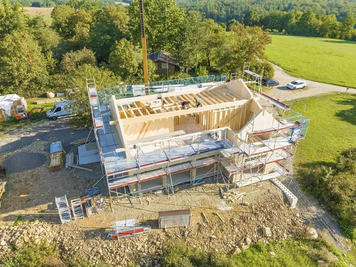 Framed Print : Timber frame construction with scaffolding and crane Framed Print : Timber frame construction with scaffolding and crane
