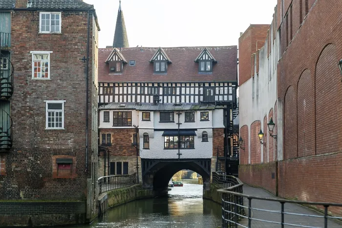 Framed Print : Timber framed buildings on historic High Bridge over River Witham Framed Print : Timber framed buildings on historic High Bridge over River Witham