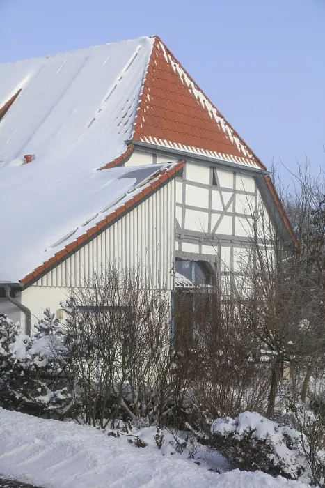 Framed Print : Timbered house, Ludersen mountain village snowed in winter after snowstorm Elli