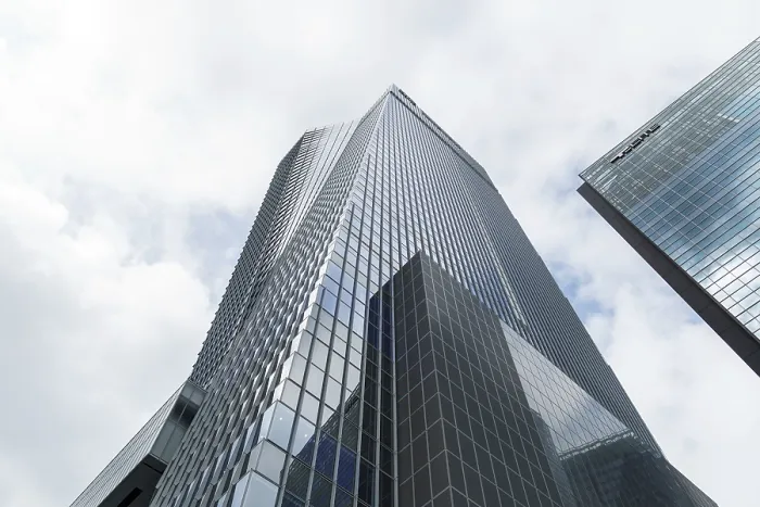 Framed Print : Tokyo, Japan - August 08, 2024: Low angle view of office buildings in Toranomon Hills area against sky