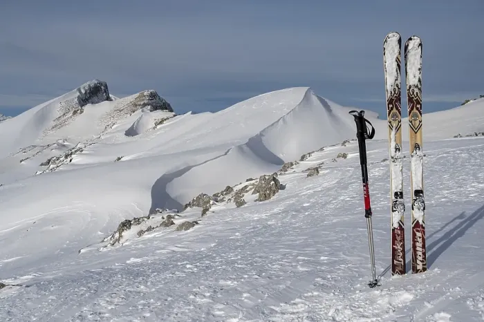 Framed Print : Touring skis with poles at the summit of Toreck