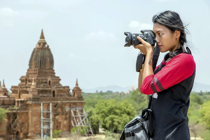 Framed Print : The tourist in Burma is photographing historical monuments