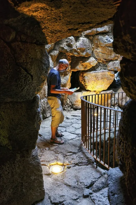 Framed Print : Tourist exploring Nuraghe Santu Antine Framed Print : Tourist exploring Nuraghe Santu Antine