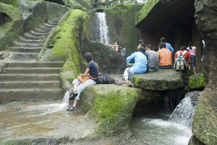 Framed Print : Tourist at waterfall of Kanheri caves built in 1st Century B Framed Print : Tourist at waterfall of Kanheri caves built in 1st Century B