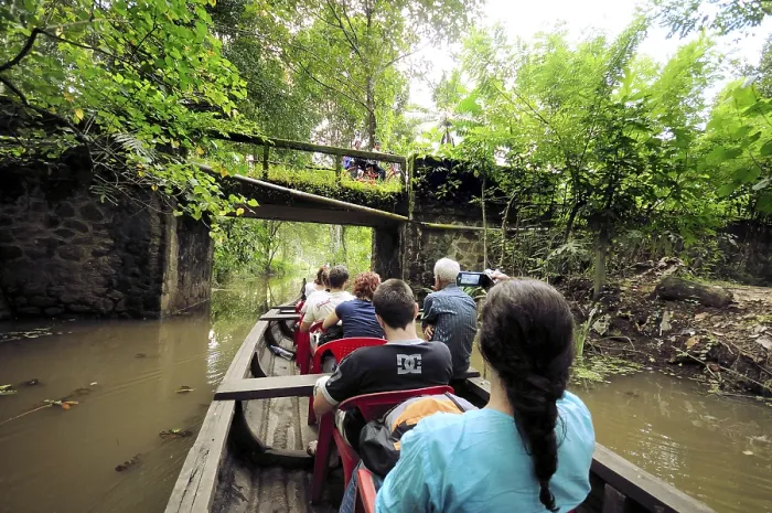 Framed Print : Tourists on boat in backwater, Ernakulam