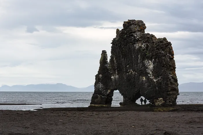 Framed Print : Tourists, couple at the basalt rock Hvitserkur Framed Print : Tourists, couple at the basalt rock Hvitserkur