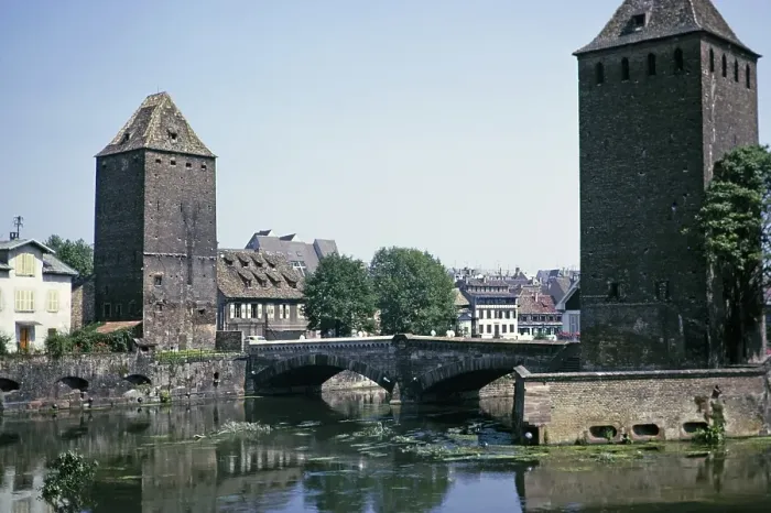 Framed Print : Towers of the medieval Ponts Couverts bridge over the River Ill in the Petite France neighbourhood of Strasbourg, France 1974