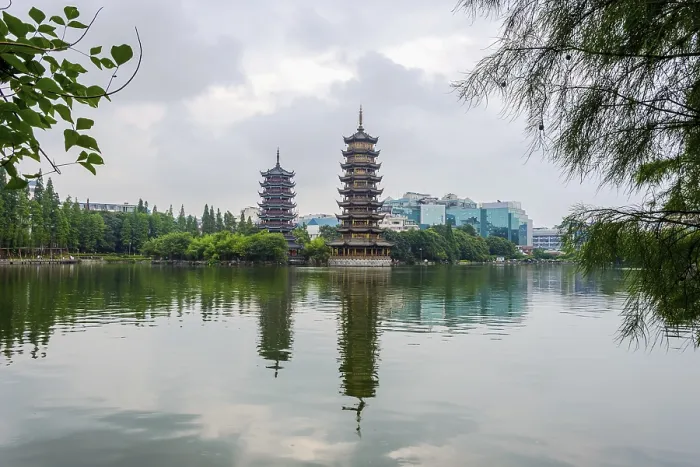 Framed Print : Two towers, pagodas of Sun and Moon by the lake