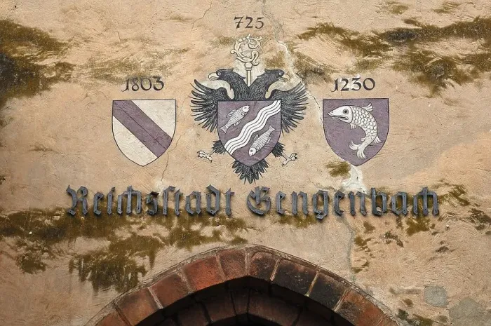 Framed Print : Three town coats of arms above the gate at the 13th century Kinzigtorturm Framed Print : Three town coats of arms above the gate at the 13th century Kinzigtorturm