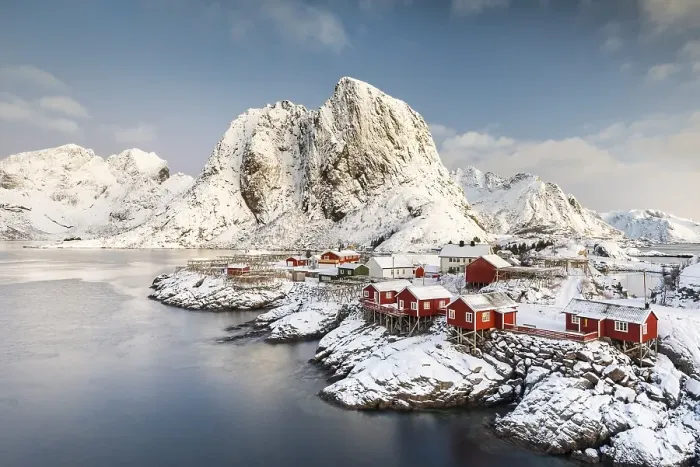 Framed Print : Town and fisherman's cabins or Rorbus in front of snowy mountains