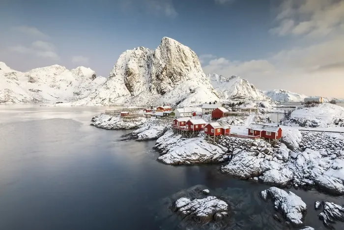 Framed Print : Town and fisherman's cabins or Rorbus in front of snowy mountains