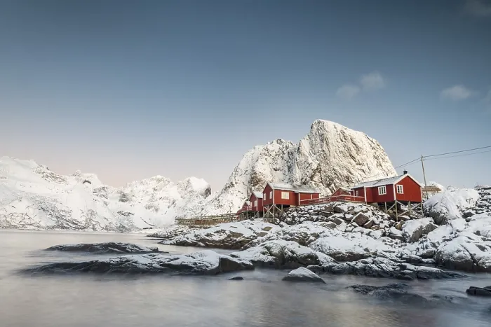 Framed Print : Town and fisherman's cabins or Rorbus in front of snowy mountains