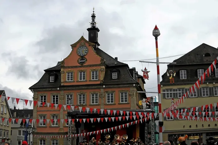 Framed Print : Town square with historic architecture and decorations indicative of a festival or event