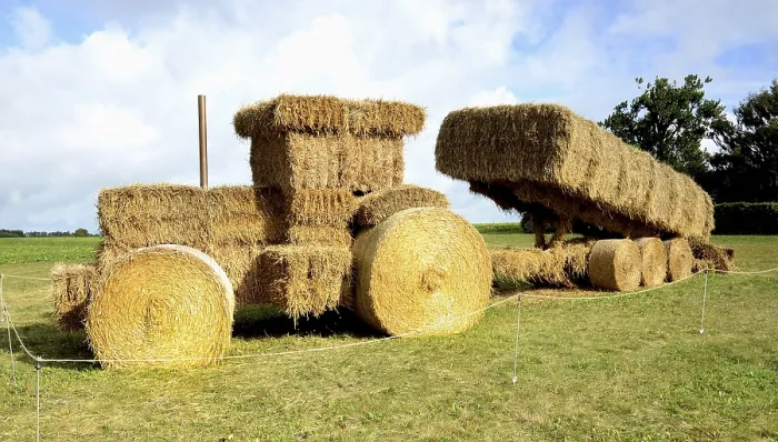 Framed Print : Tractor and trailer made of straw bales Framed Print : Tractor and trailer made of straw bales