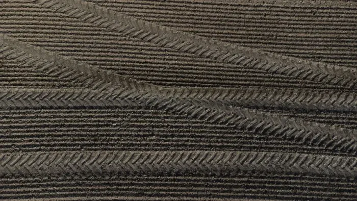 Framed Print : Tractor tyre tracks form an interesting pattern on a freshly cultivated field without vegetation Framed Print : Tractor tyre tracks form an interesting pattern on a freshly cultivated field without vegetation