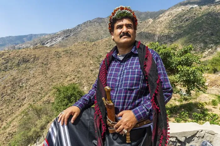 Framed Print : Traditional dressed man of the Qahtani Flower men tribe in the coffee plants