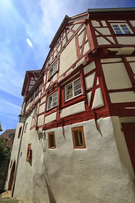 Framed Print : Traditional half-timbered house with distinctive red beams and white facade elements in Bad Wimpfen