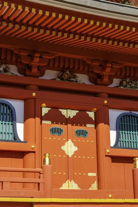 Framed Print : Traditional Japanese temple architecture with red and gold structures and detailed decorations