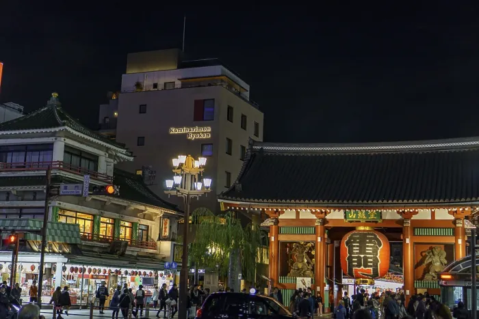 Framed Print : A traditional Japanese temple next to a busy street at night Framed Print : A traditional Japanese temple next to a busy street at night