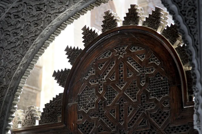 Framed Print : Traditional wooden door with complex Islamic decorations in Medersa Attarine