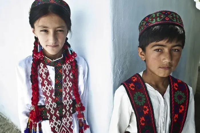 Framed Print : Traditionally dressed Pamiri children