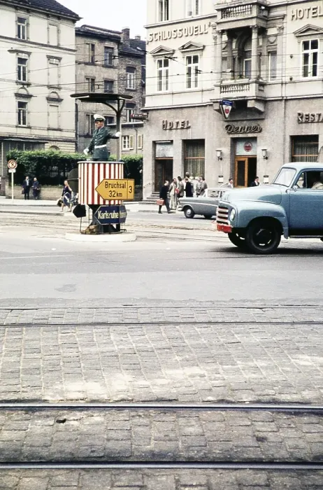 Framed Print : Traffic policeman on the street in front of a hotel, Bergheimer Strasse, Heidelberg, Baden-Wuerttemberg, Germany, Europe, 1959, Europe