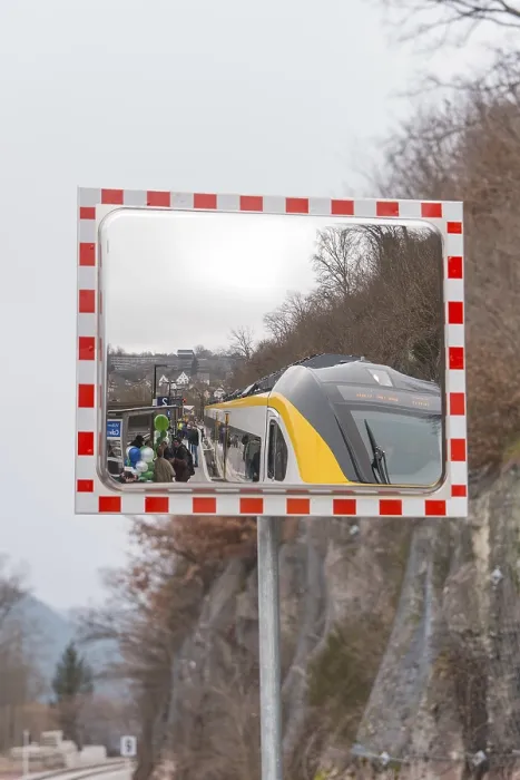 Framed Print : A train in the mirror on a railroad track in a mountainous area Framed Print : A train in the mirror on a railroad track in a mountainous area
