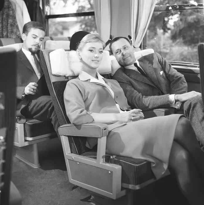 Framed Print : Train travel in the 1960s. A couple on a train, sitting comfortably in their chairs during the trip. Sweden 1960s Kristoffersson ref DD118-11