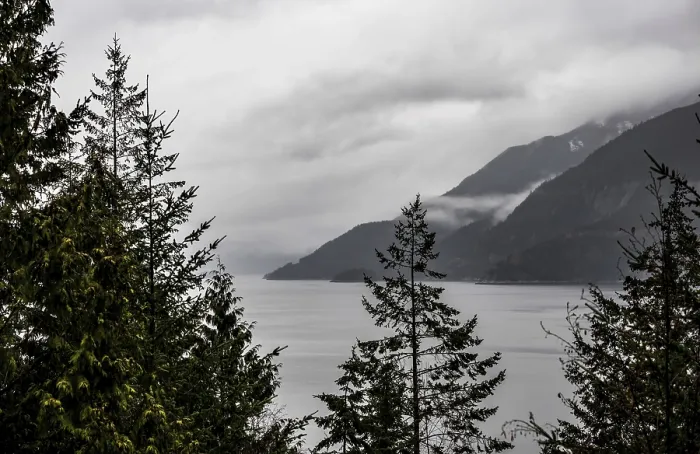 Framed Print : Tranquil lake framed by misty mountains Framed Print : Tranquil lake framed by misty mountains